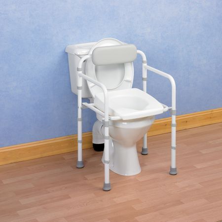 Folding Toilet Frame With A Padded Backrest.